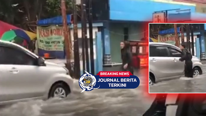[VIDEO] Pria Tegur Pengemudi Mobil yang Melaju Kencang Saat Melewati Genangan Banjir